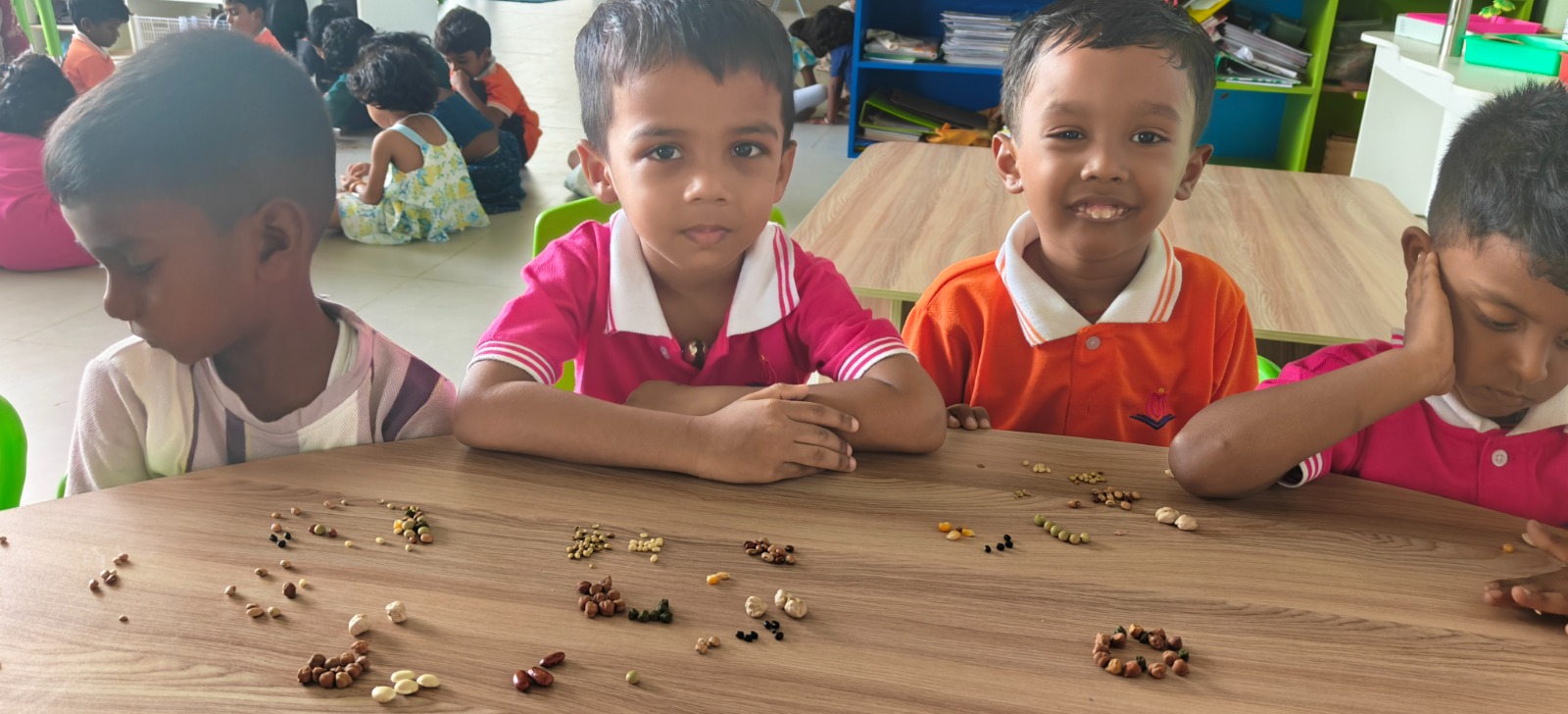 Students sorting and grouping seeds during a Creative Challenge activity