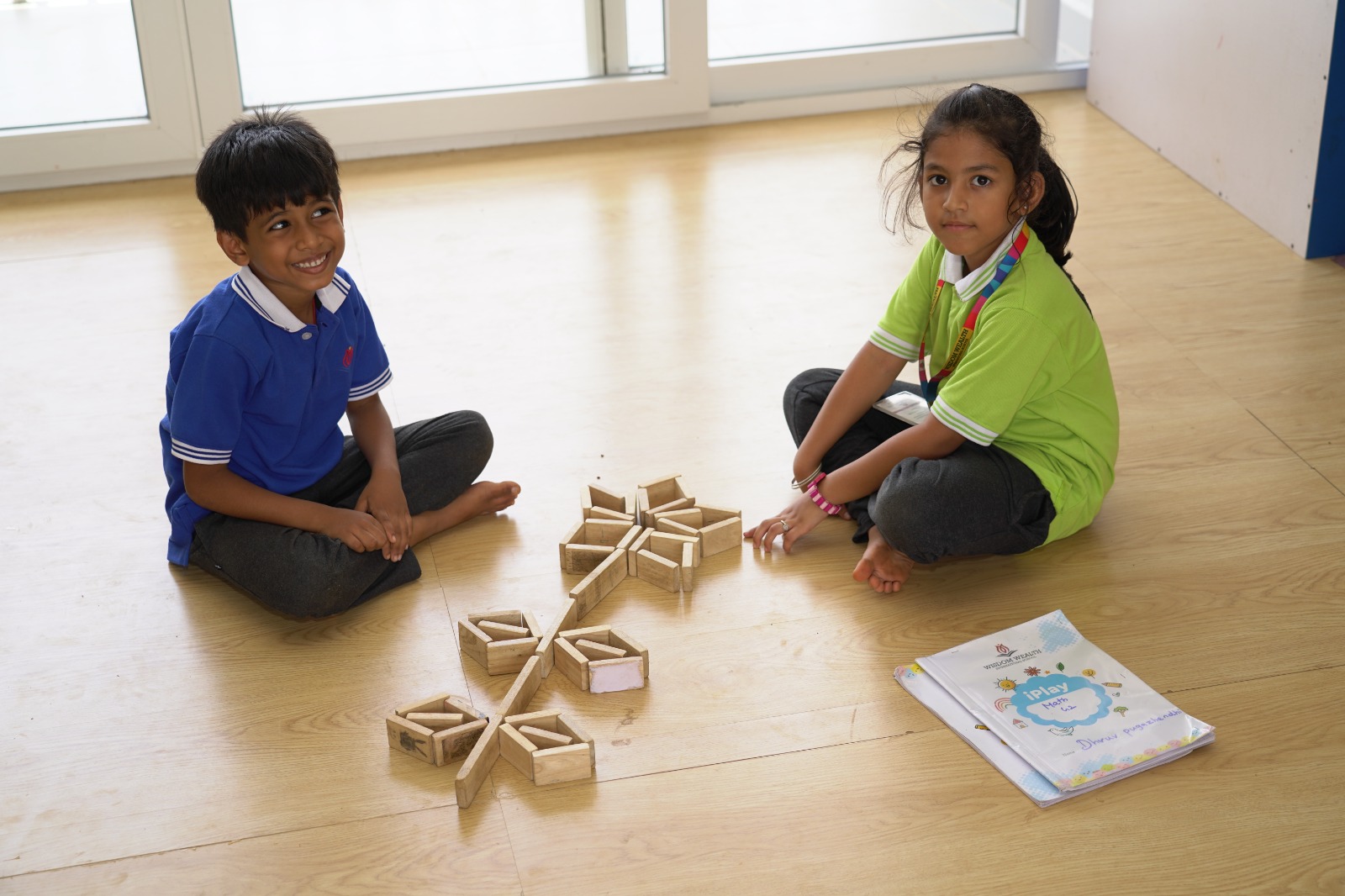 Students exploring and building independently during Independent Time