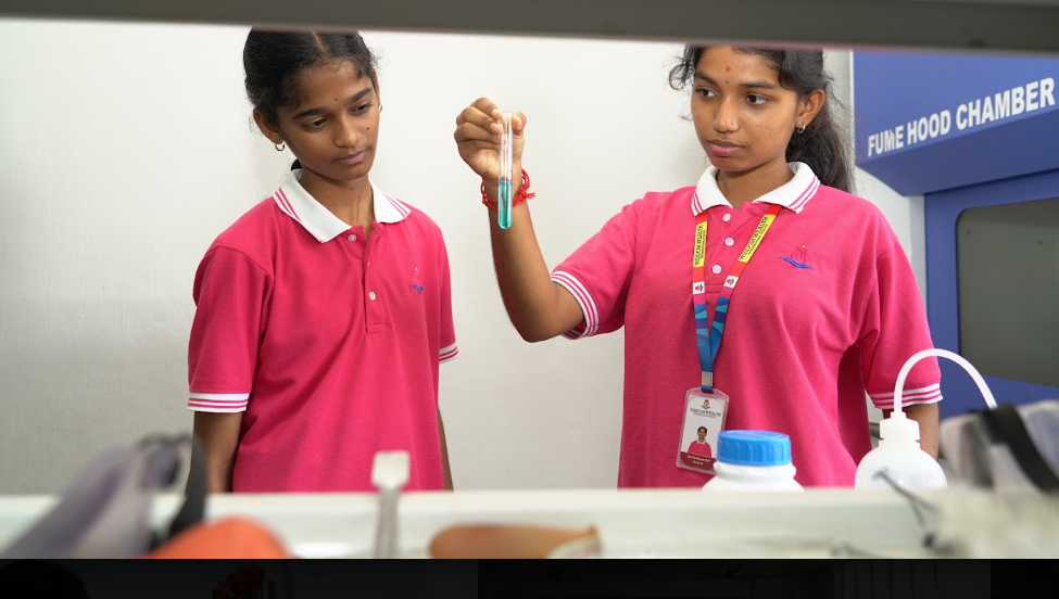 iLead students conducting a science experiment in the lab